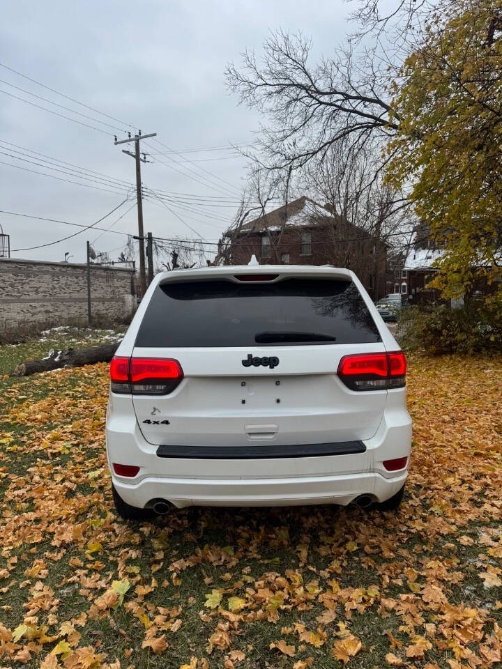 2014 Jeep Grand Cherokee for sale at H & H AUTO GROUP in Detroit, MI