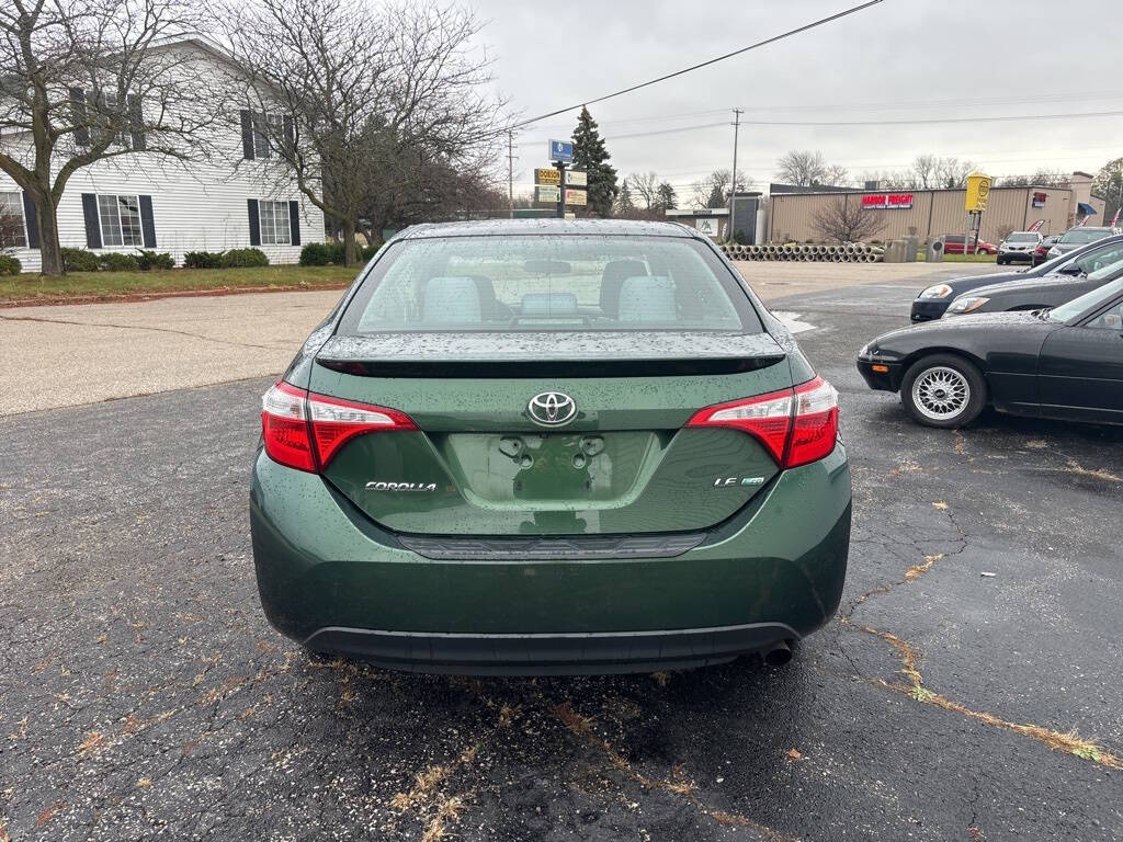 2015 Toyota Corolla for sale at DECKER AUTO SALES in Bay City, MI