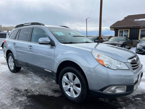 2012 Subaru Outback for sale at BERKENKOTTER MOTORS in Brighton CO