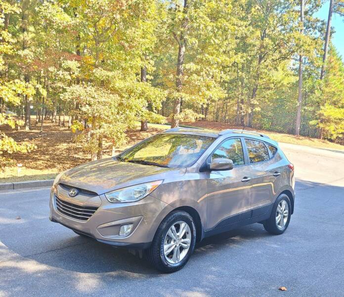 2013 Hyundai Tucson for sale at Coreas Auto Sales in Canton GA