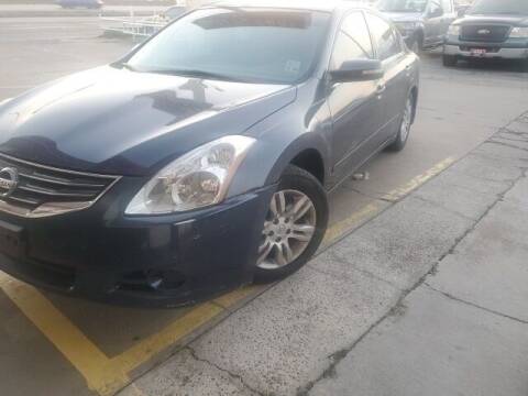 2012 Nissan Altima for sale at FREDYS CARS FOR LESS in Houston TX