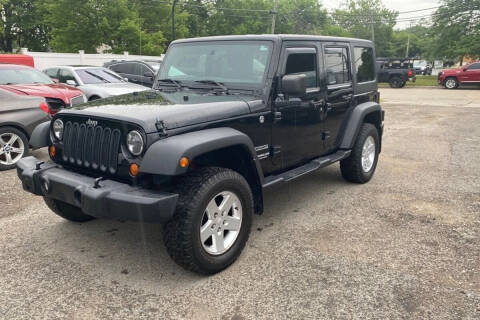 2011 Jeep Wrangler Unlimited for sale at Automania in Dearborn Heights MI