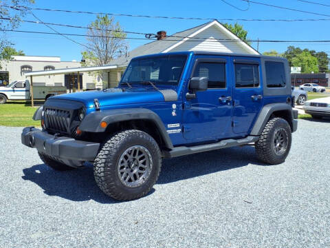 2010 Jeep Wrangler Unlimited for sale at Auto Mart in Kannapolis NC