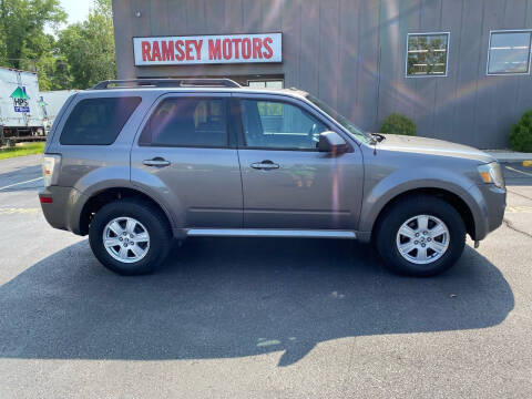 2011 Mercury Mariner for sale at Ramsey Motors in Riverside MO