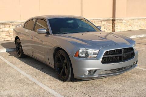 2014 Dodge Charger for sale at ALL STAR MOTORS INC in Houston TX