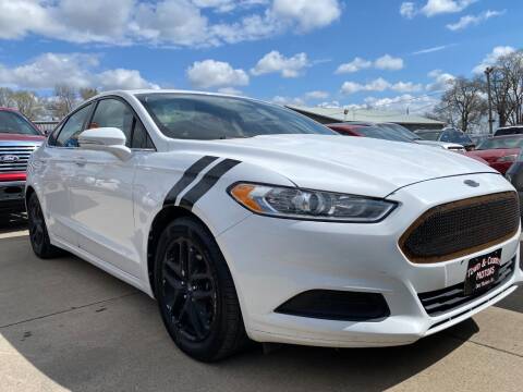 2013 Ford Fusion for sale at TOWN & COUNTRY MOTORS in Des Moines IA