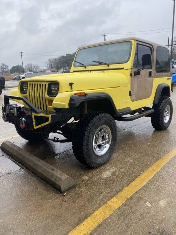1990 Jeep Wrangler for sale at PITTMAN MOTOR CO in Lindale TX