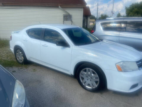 2014 Dodge Avenger for sale at RICK'S AUTO SALES in Logansport IN