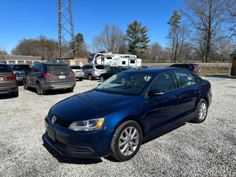 2012 Volkswagen Jetta for sale at Lake Auto Sales in Hartville OH