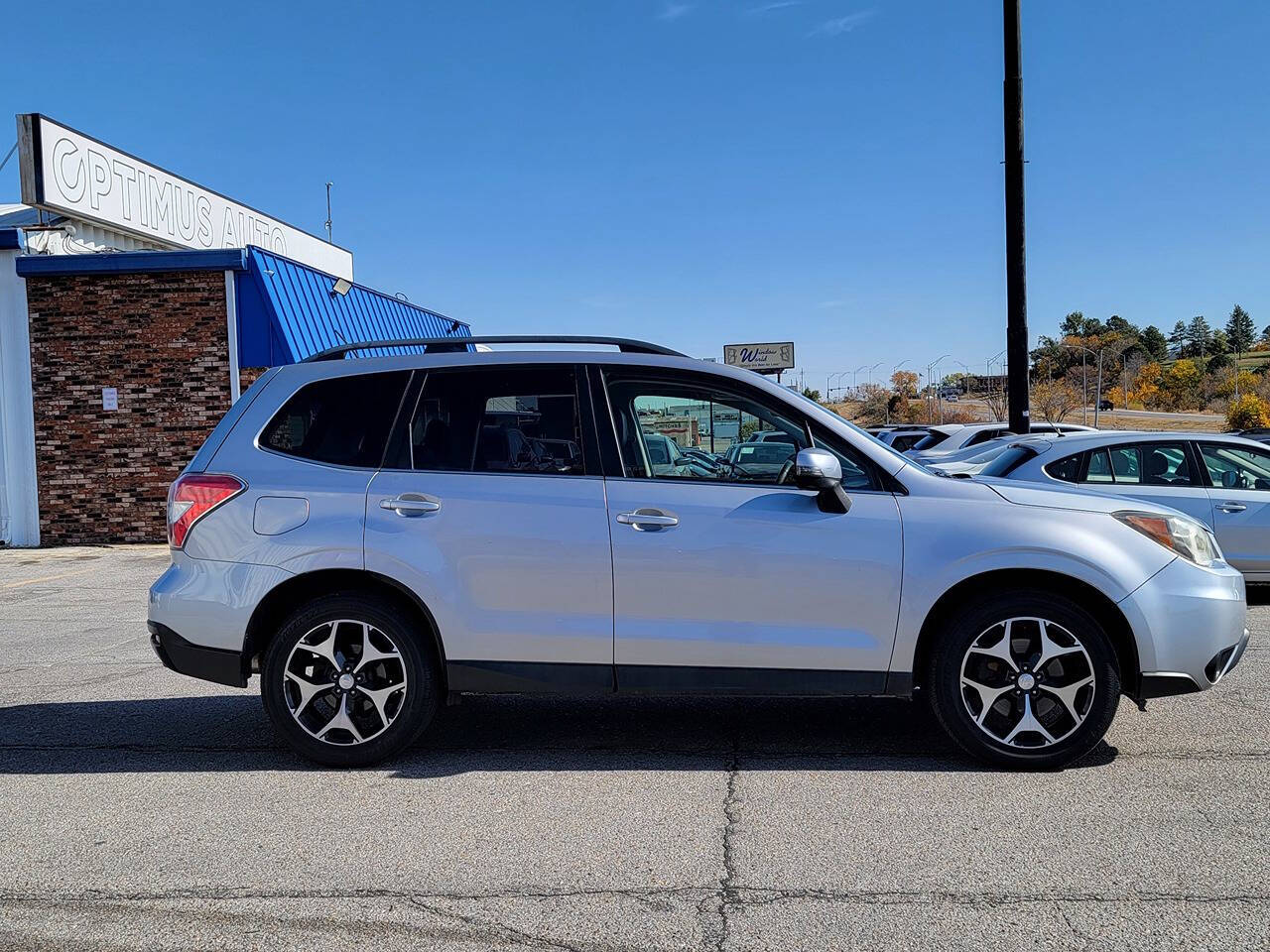 2014 Subaru Forester for sale at Optimus Auto in Omaha, NE