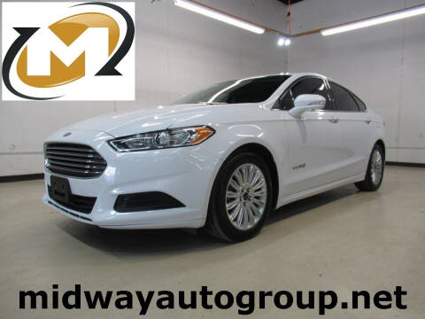 2016 Ford Fusion Hybrid for sale at Midway Auto Group in Addison TX