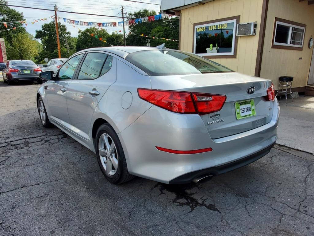 2014 Kia Optima for sale at DAGO'S AUTO SALES LLC in Dalton, GA