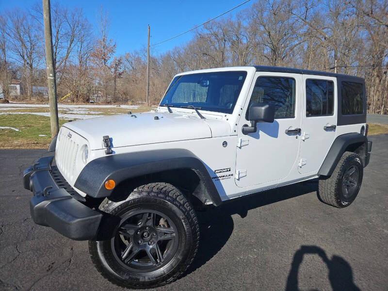 2013 Jeep Wrangler Unlimited for sale at Depue Auto Sales Inc in Paw Paw MI