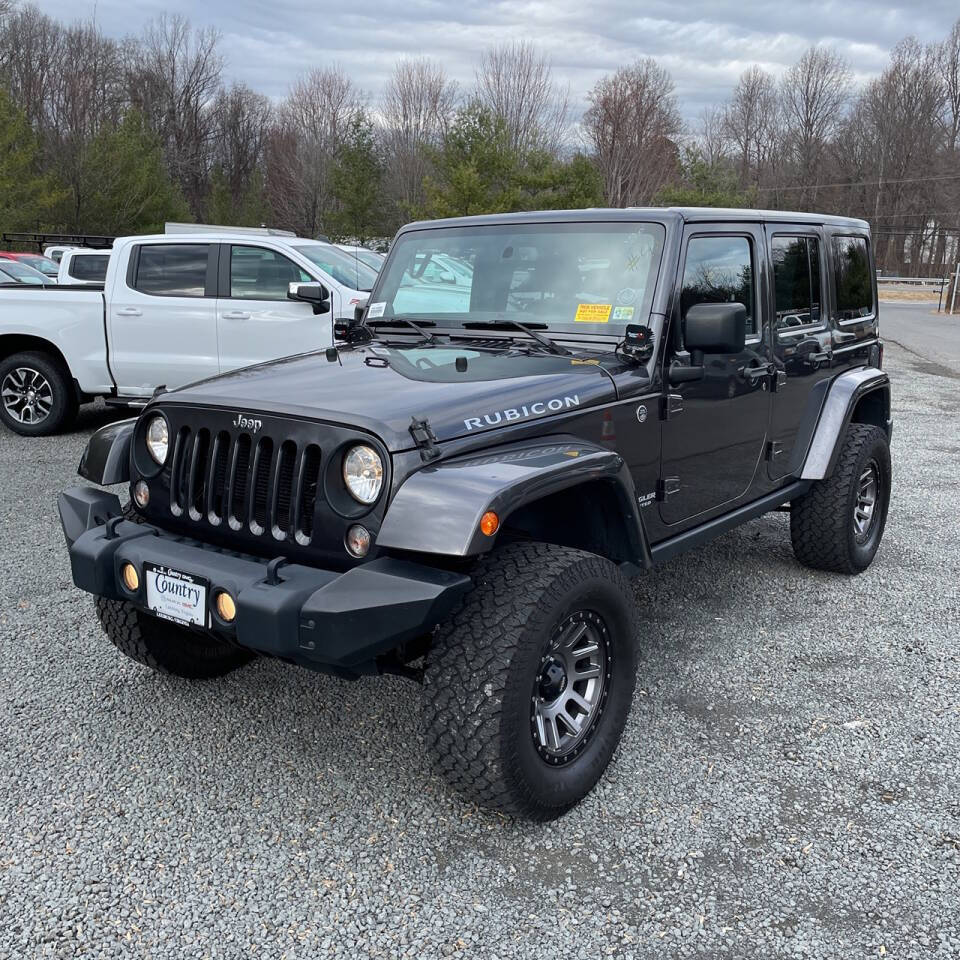 2014 Jeep Wrangler Unlimited for sale at JM4 Auto in Webster, NY