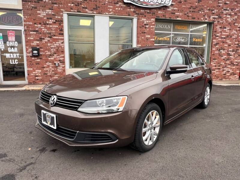 2013 Volkswagen Jetta for sale at Ohio Car Mart in Elyria OH