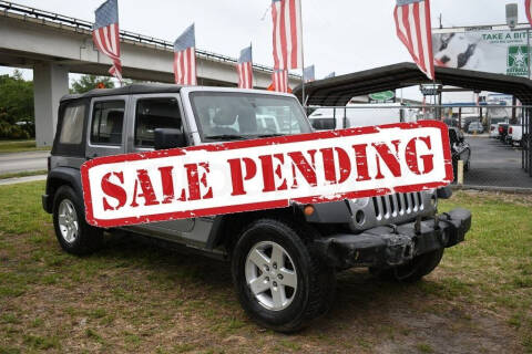 2016 Jeep Wrangler Unlimited for sale at STS Automotive - MIAMI in Miami FL