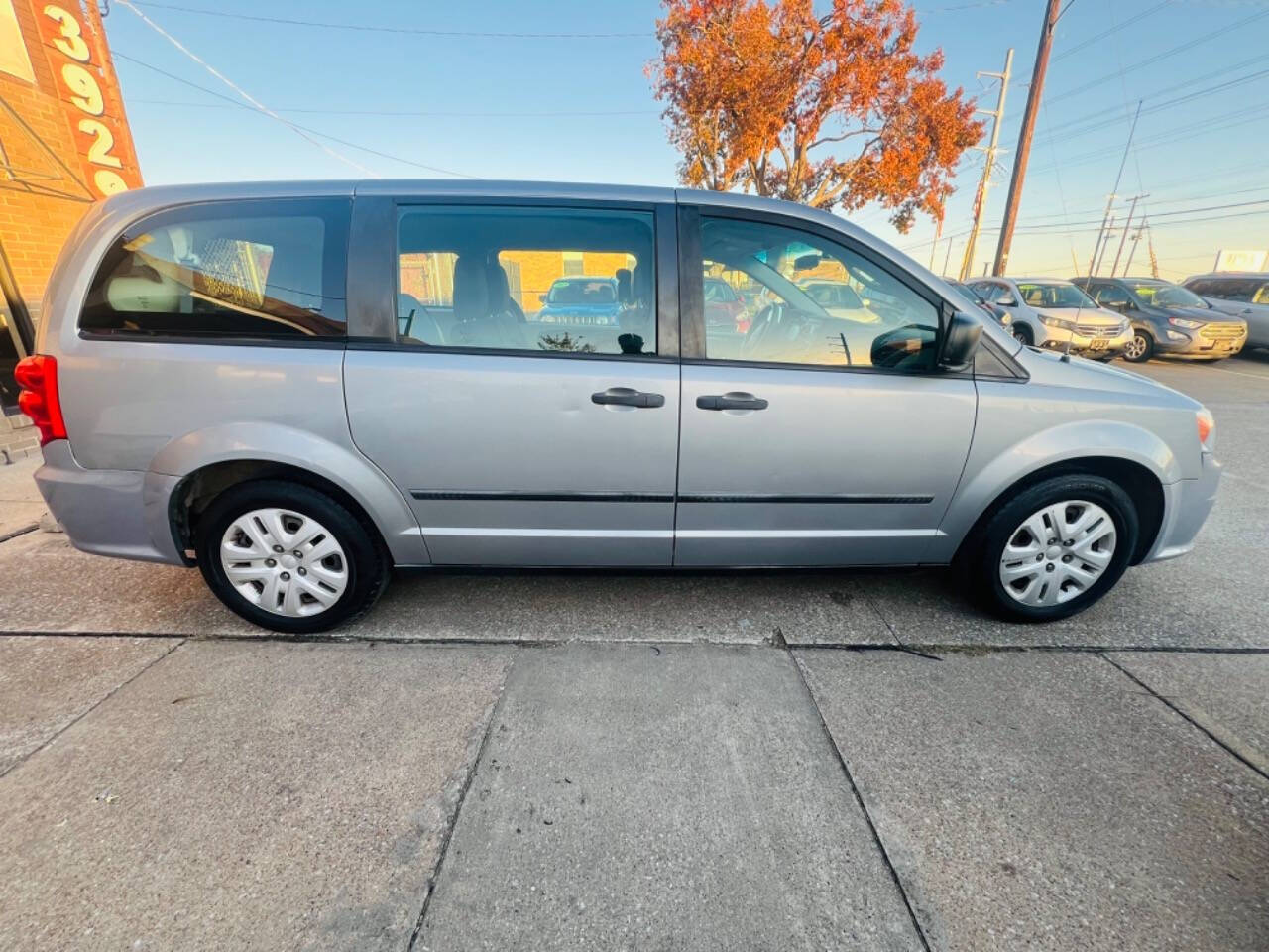 2015 Dodge Grand Caravan for sale at Drive Way Autos in Garland, TX