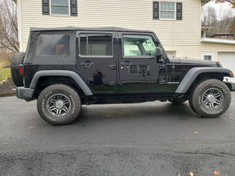 2016 Jeep Wrangler Unlimited for sale at Jaxx Auto Outlet in Yeagertown PA