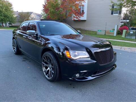 2013 Chrysler 300 for sale at You Win Auto in Burnsville MN