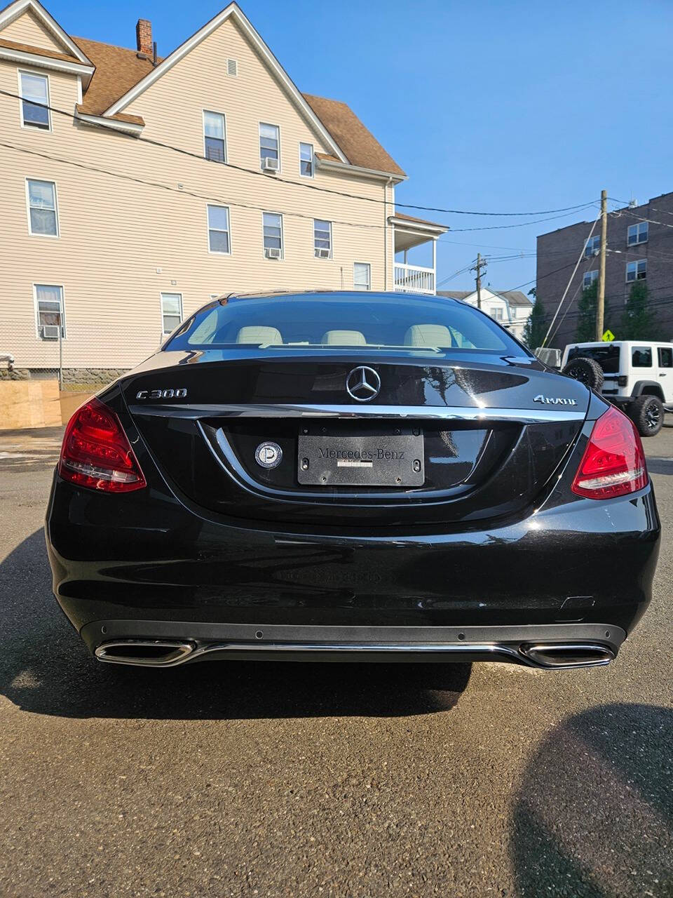 2015 Mercedes-Benz C-Class for sale at RENOS AUTO SALES LLC in Waterbury, CT