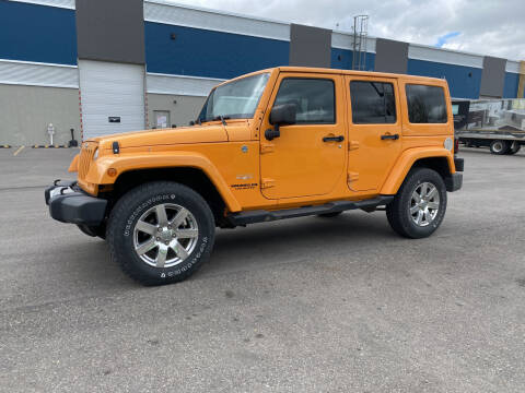2013 Jeep Wrangler Unlimited for sale at Truck Buyers in Magrath AB