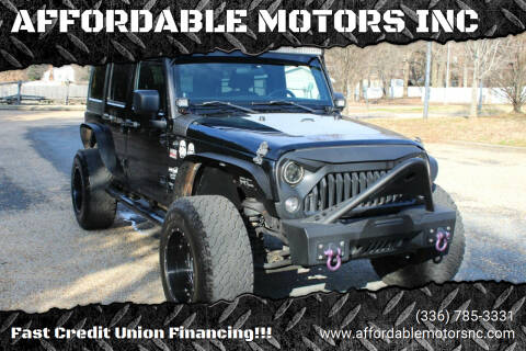 2014 Jeep Wrangler Unlimited for sale at AFFORDABLE MOTORS INC in Winston Salem NC