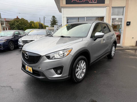 2014 Mazda CX-5 for sale at ADAM AUTO AGENCY in Rensselaer NY