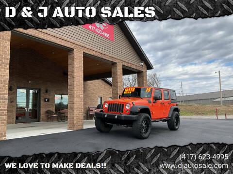 2015 Jeep Wrangler Unlimited for sale at D & J AUTO SALES in Joplin MO