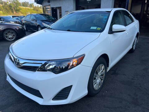 2013 Toyota Camry for sale at Goodfellas Auto Sales LLC in Clifton NJ