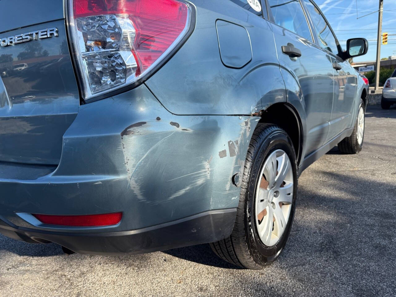 2009 Subaru Forester for sale at AVS AUTO GROUP LLC in CLEVELAND, OH