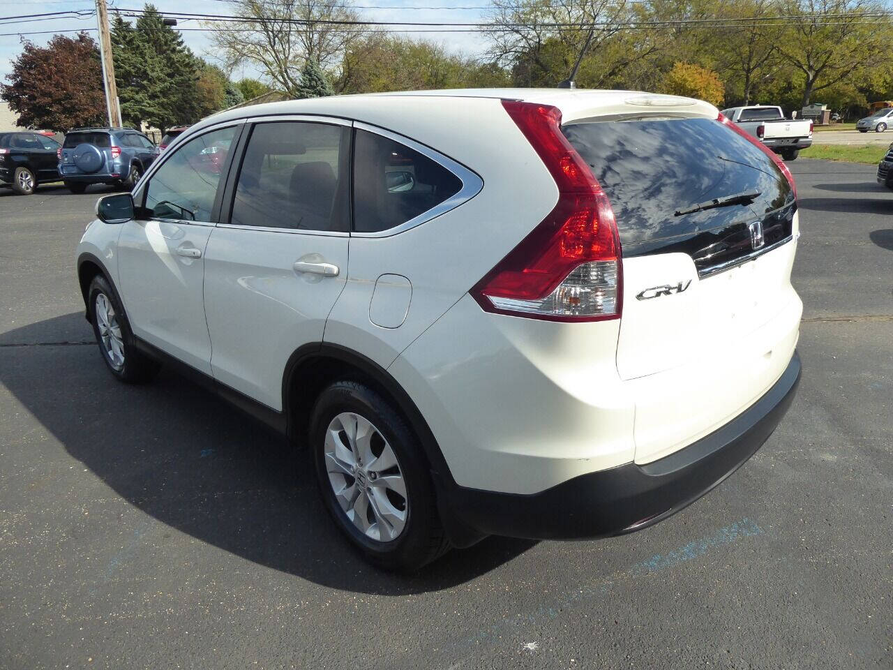 2012 Honda CR-V for sale at Lakeshore Autos in Holland, MI