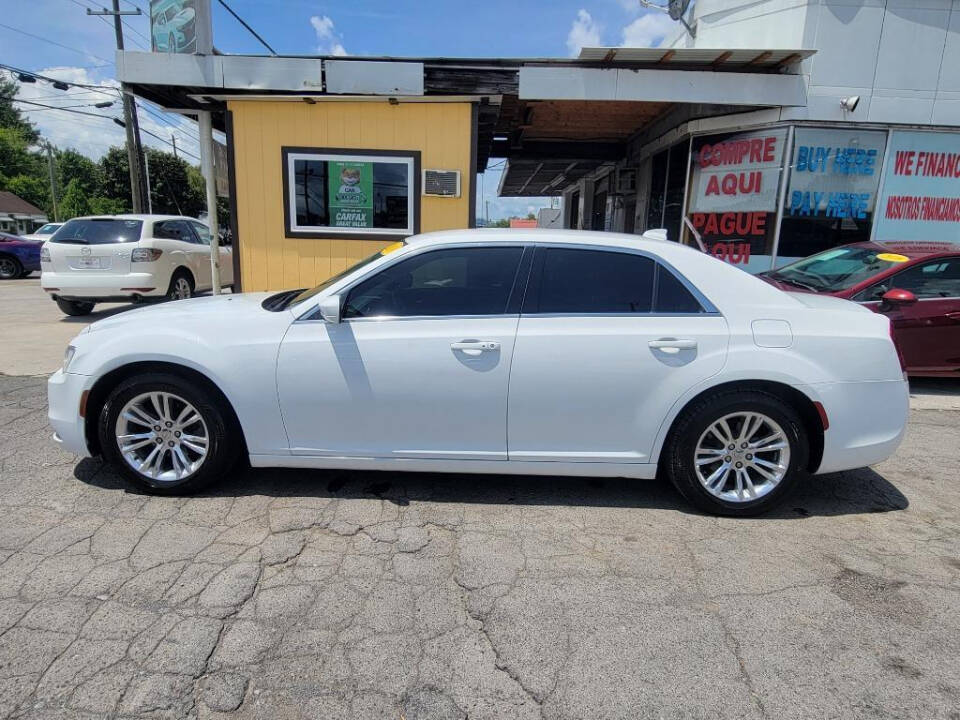 2018 Chrysler 300 for sale at DAGO'S AUTO SALES LLC in Dalton, GA