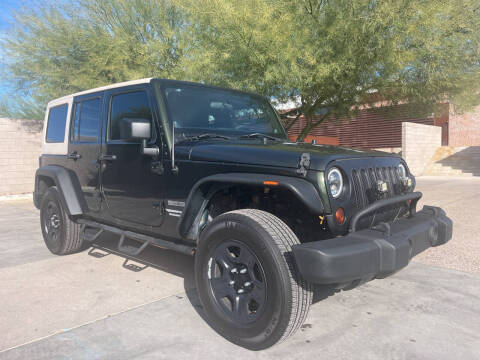 2011 Jeep Wrangler Unlimited for sale at Town and Country Motors in Mesa AZ