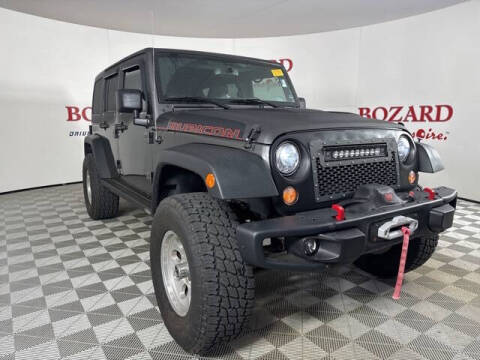 2017 Jeep Wrangler Unlimited for sale at BOZARD FORD in Saint Augustine FL