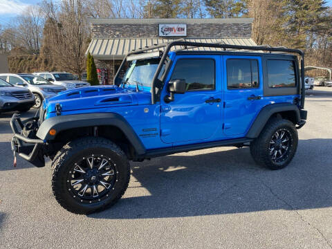 2016 Jeep Wrangler Unlimited for sale at Driven Pre-Owned in Lenoir NC
