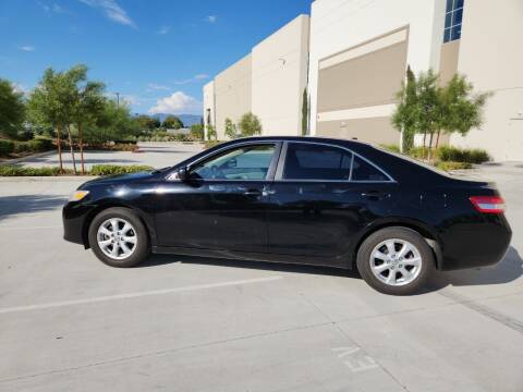 2011 Toyota Camry for sale at E and M Auto Sales in Bloomington CA