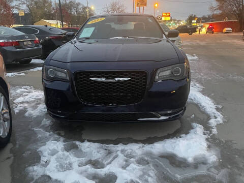 2015 Chrysler 300 for sale at Azteca Auto Sales LLC in Des Moines IA
