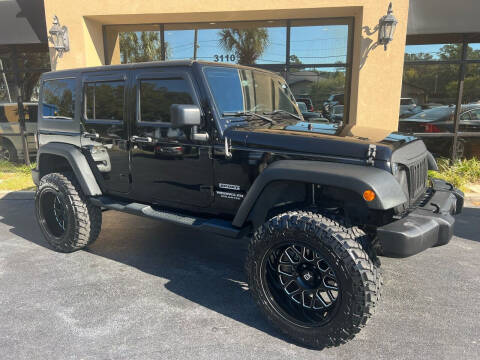 2015 Jeep Wrangler Unlimited for sale at Premier Motorcars Inc in Tallahassee FL