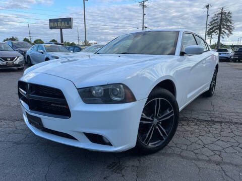 2014 Dodge Charger for sale at ALNABALI AUTO MALL INC. in Machesney Park IL