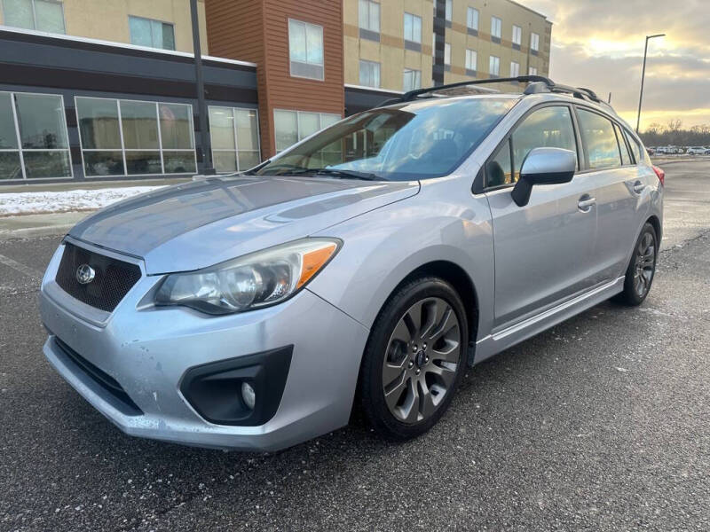 2012 Subaru Impreza for sale at The Car Mart in Milford IN