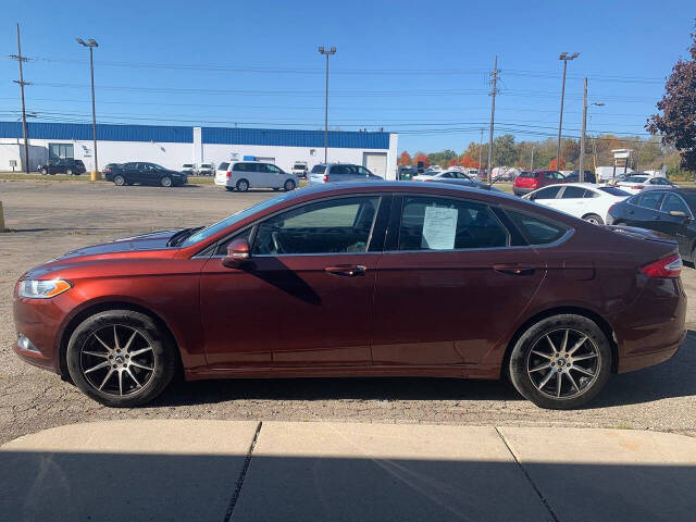 2016 Ford Fusion for sale at Cars On Demand LLC in Lansing, MI