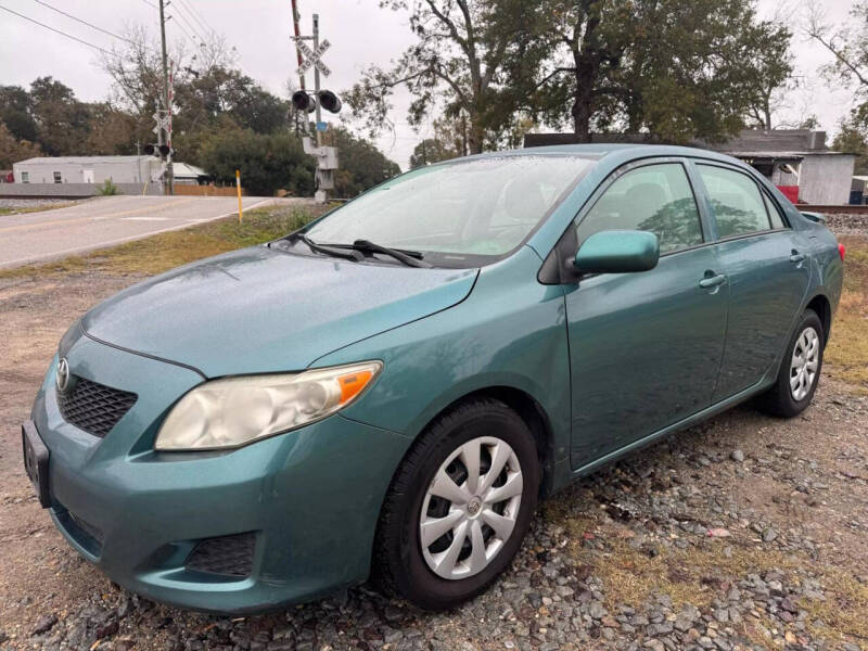 2010 Toyota Corolla LE photo 1