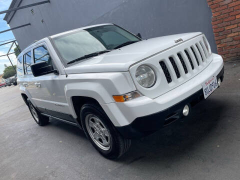 2012 Jeep Patriot for sale at EV MOTORS in Pico Rivera CA