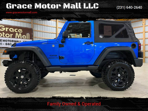 2015 Jeep Wrangler for sale at Grace Motor Mall LLC in Traverse City MI
