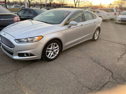 2014 Ford Fusion for sale at J & J Used Cars inc in Wayne MI