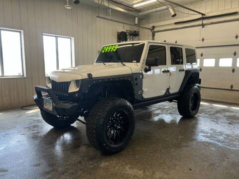 2014 Jeep Wrangler Unlimited for sale at Sand's Auto Sales in Cambridge MN