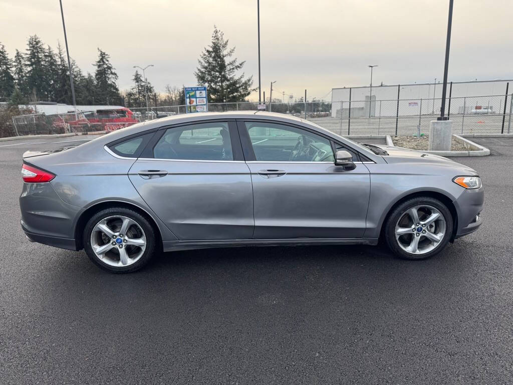 2013 Ford Fusion for sale at The Price King Auto in LAKEWOOD, WA