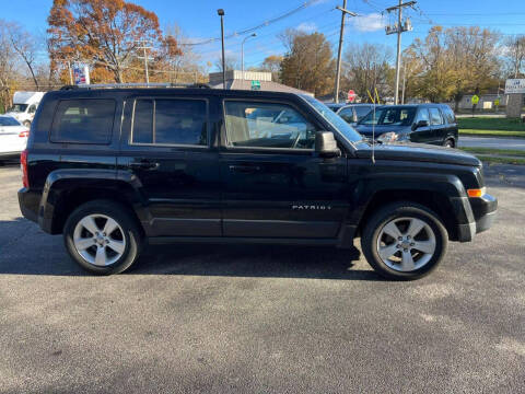 2014 Jeep Patriot for sale at VINE STREET MOTOR CO in Urbana IL