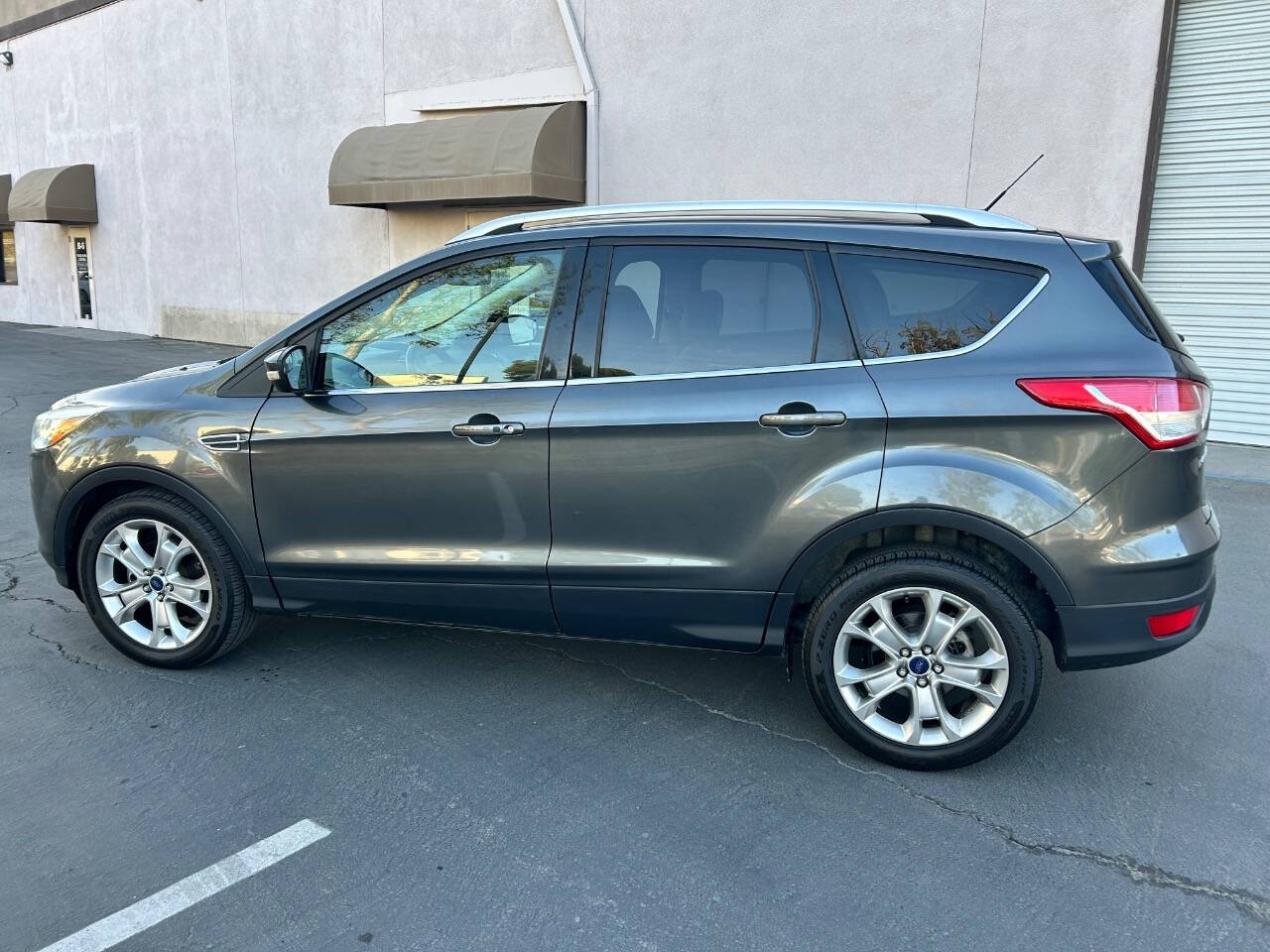 2016 Ford Escape for sale at STM AUTO GROUP LLC in Corona, CA