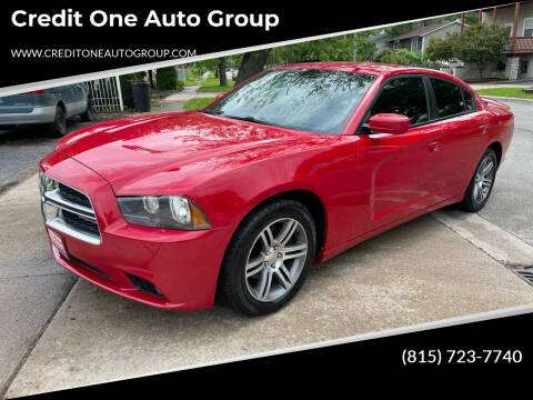2013 Dodge Charger for sale at Credit One Auto Group in Joliet IL